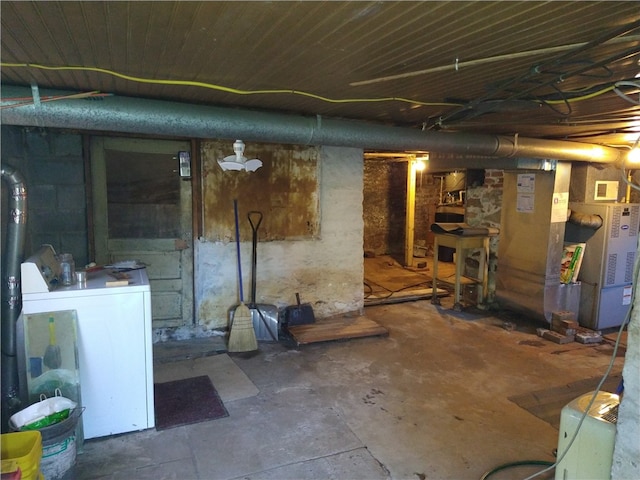 unfinished basement featuring separate washer and dryer