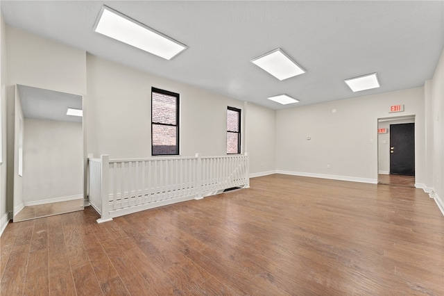 spare room with light hardwood / wood-style flooring