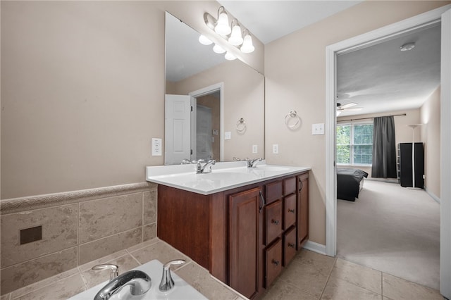 bathroom with vanity, ceiling fan, and tile patterned floors