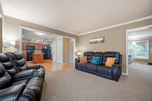 living room featuring crown molding and light colored carpet