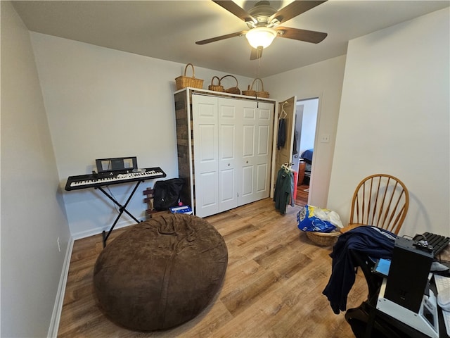 interior space featuring ceiling fan and hardwood / wood-style flooring