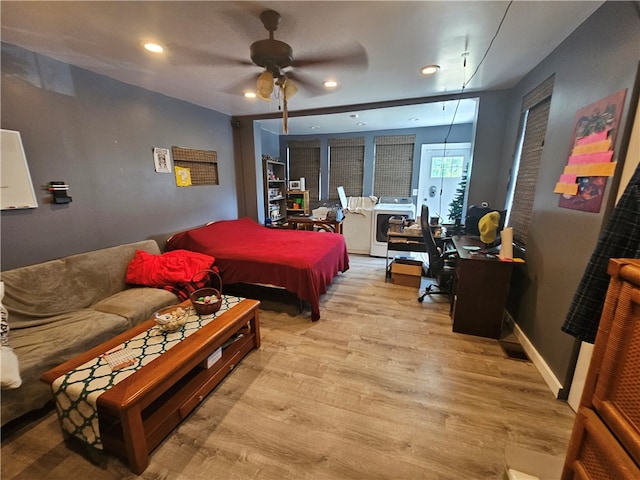 bedroom featuring ceiling fan and light wood-type flooring