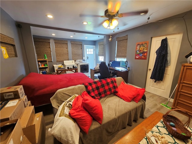 bedroom with ceiling fan and hardwood / wood-style flooring