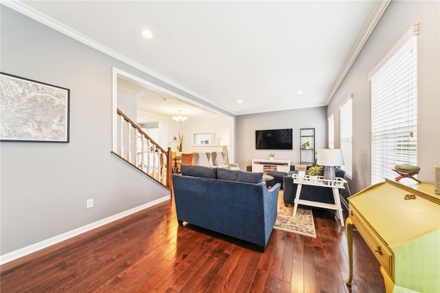 living room featuring ornamental molding and dark hardwood / wood-style floors