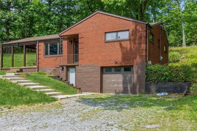 view of side of property with a garage