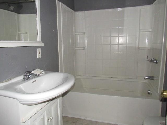 full bathroom featuring tile patterned flooring, bathtub / shower combination, and vanity