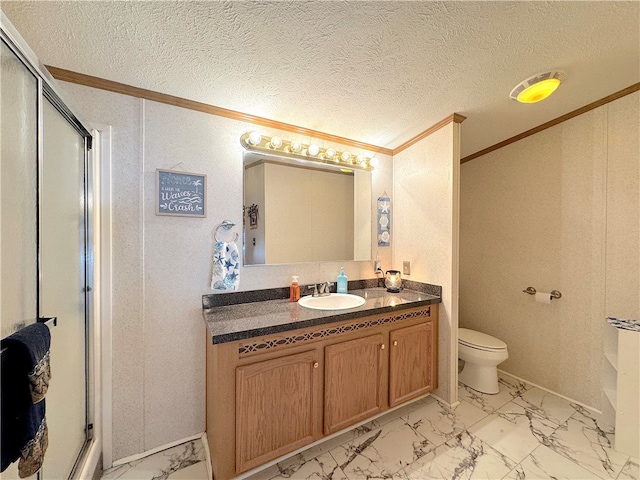 bathroom featuring a textured ceiling, vanity, toilet, and a shower with shower door