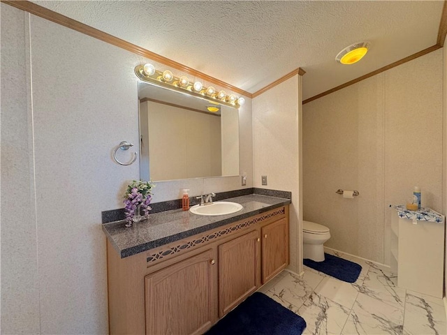 bathroom with a textured ceiling, toilet, vanity, marble finish floor, and ornamental molding