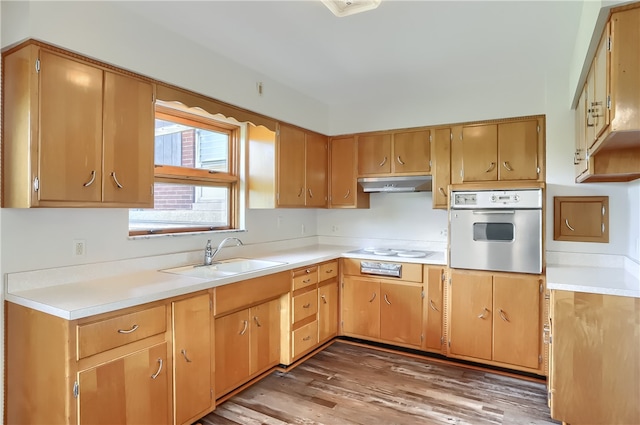 kitchen featuring sink, dark wood-type flooring, white electric cooktop, and stainless steel oven