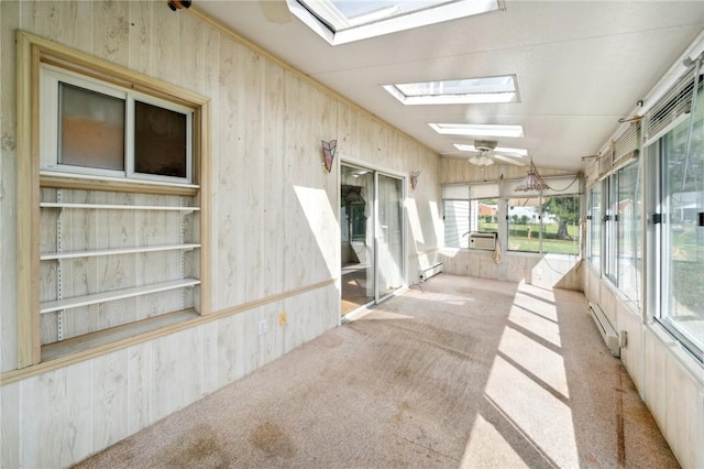 unfurnished sunroom with a skylight, baseboard heating, and ceiling fan