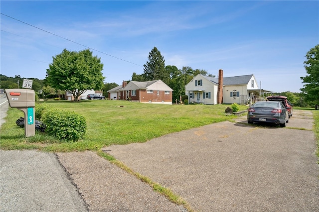 view of front of home with a front yard