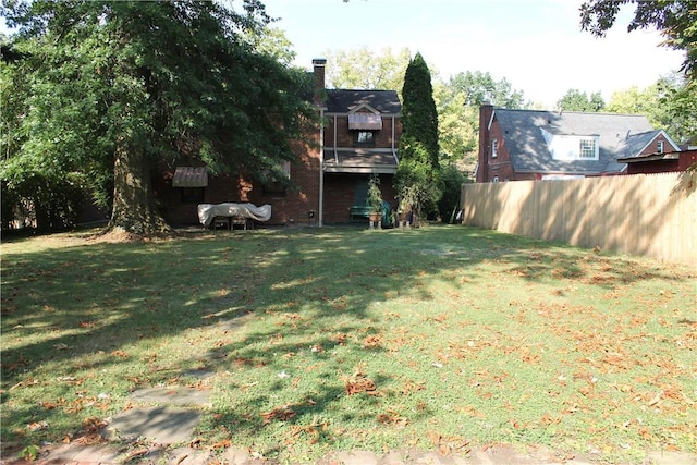 view of yard featuring fence