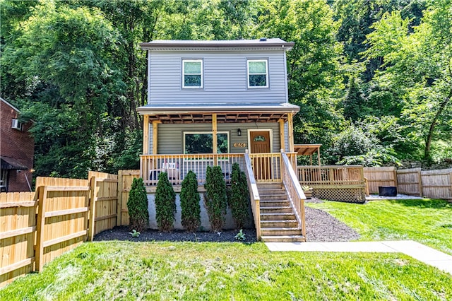 view of front of house with a front lawn