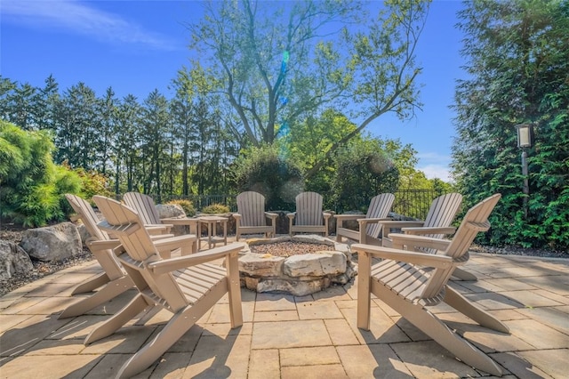 view of patio / terrace with a fire pit