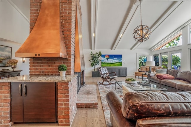 living room featuring light wood-type flooring, brick wall, high vaulted ceiling, beam ceiling, and french doors