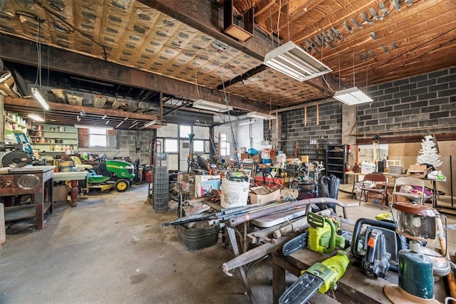 garage with a workshop area