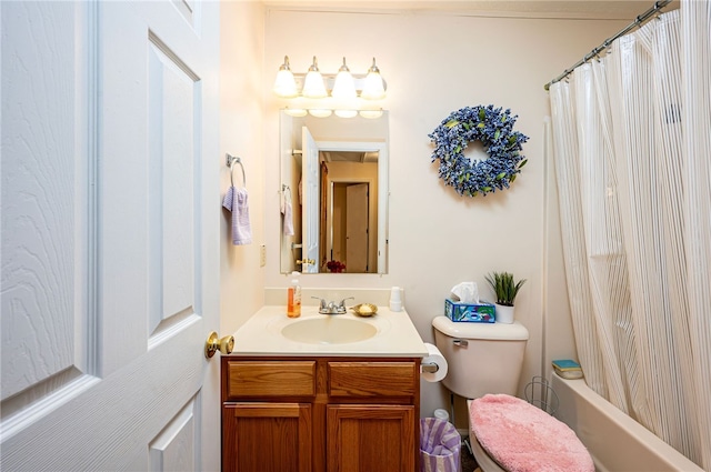 full bathroom with toilet, vanity, and shower / bath combo with shower curtain