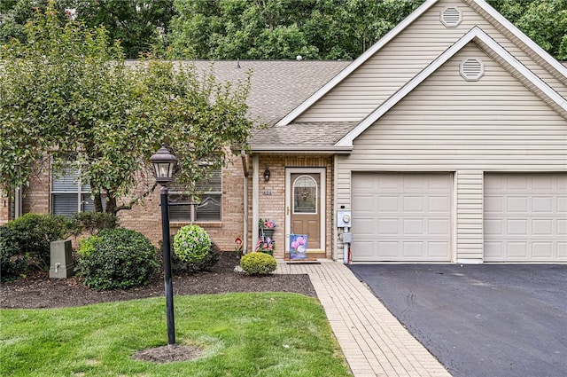 single story home featuring a garage