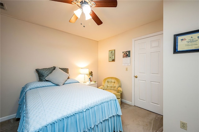 carpeted bedroom featuring ceiling fan