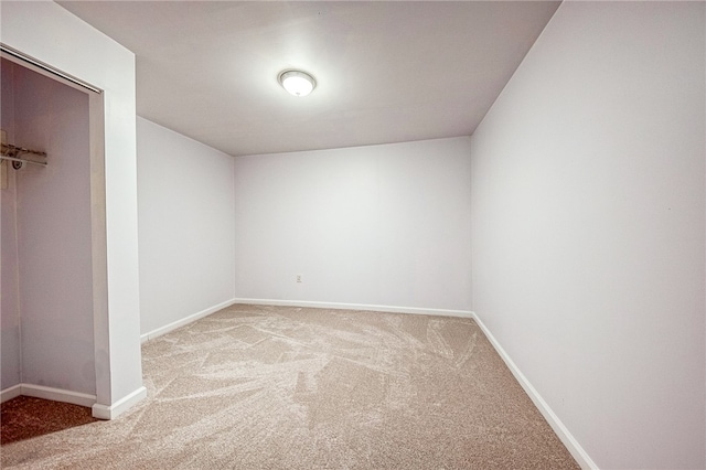 unfurnished room featuring carpet flooring