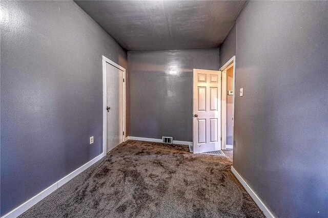 corridor with carpet floors