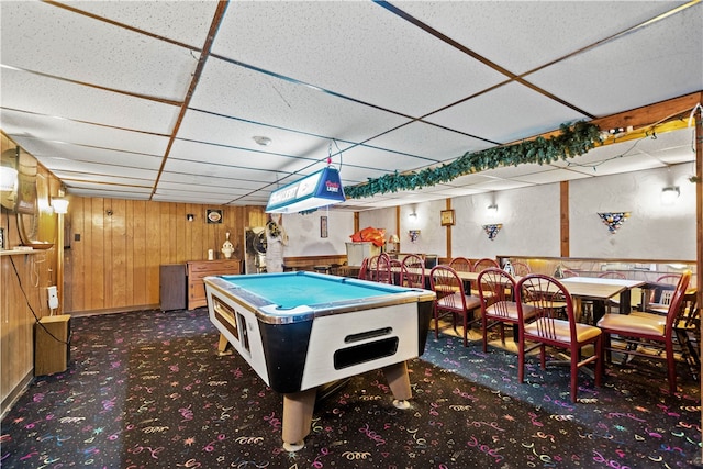 recreation room featuring billiards, wood walls, carpet floors, and a paneled ceiling