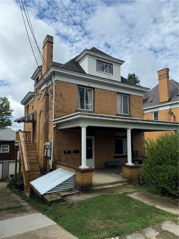 175 Penn Ave, Mount Oliver, PA 15210 - back of property with brick siding, a chimney, and stairs