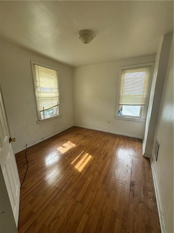 175 Penn Ave, Mount Oliver, PA 15210 - empty room featuring baseboards and hardwood / wood-style floors