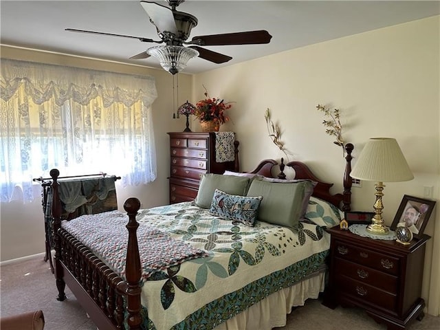 bedroom featuring ceiling fan and carpet floors