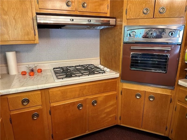 kitchen featuring gas cooktop and oven