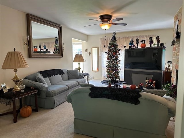 carpeted living room featuring ceiling fan