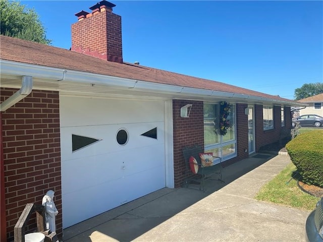 exterior space with a garage