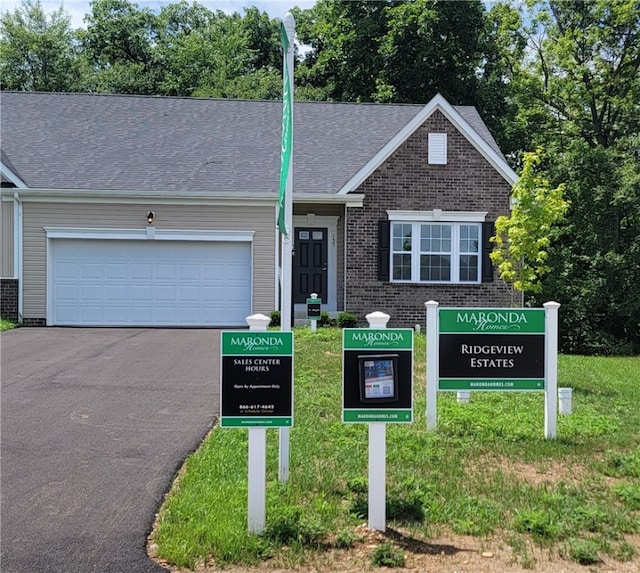 view of front of property featuring a garage