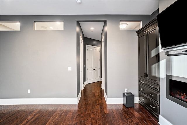 interior space with dark wood-type flooring