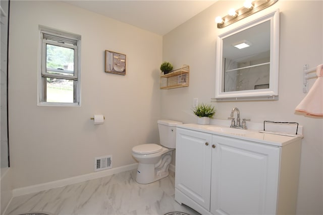 bathroom with tile patterned floors, walk in shower, toilet, and vanity