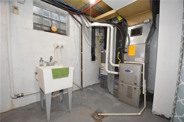 utilities featuring sink and water heater