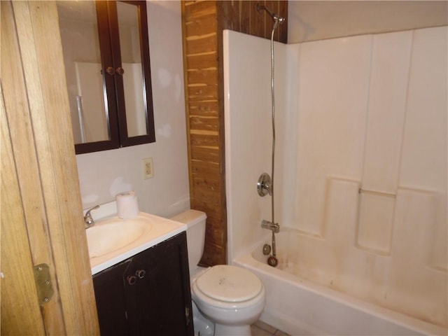 full bathroom with vanity,  shower combination, and toilet