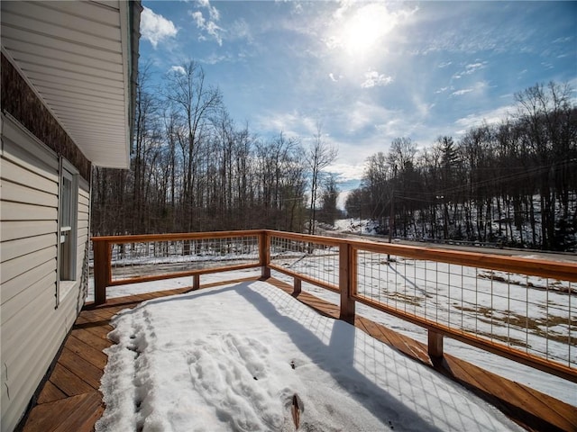 view of snow covered deck