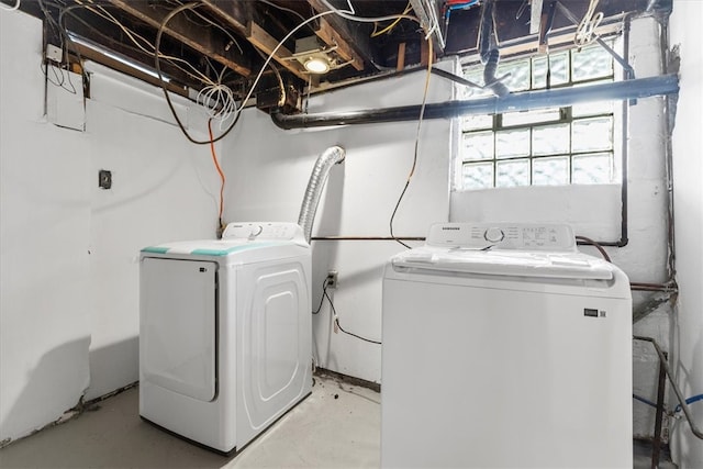 laundry area with separate washer and dryer