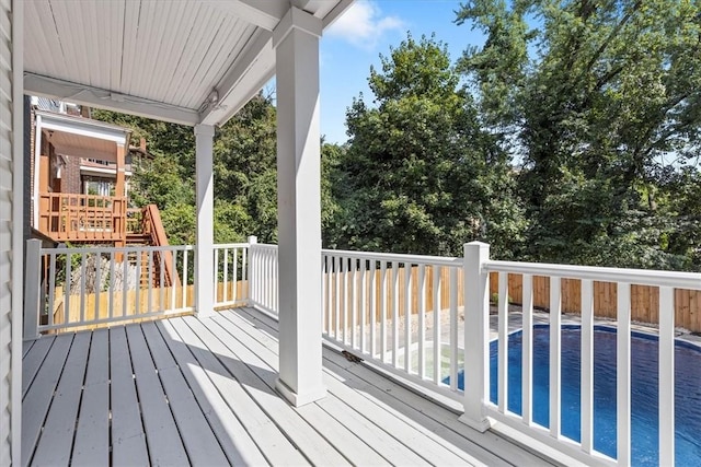 deck with a swimming pool