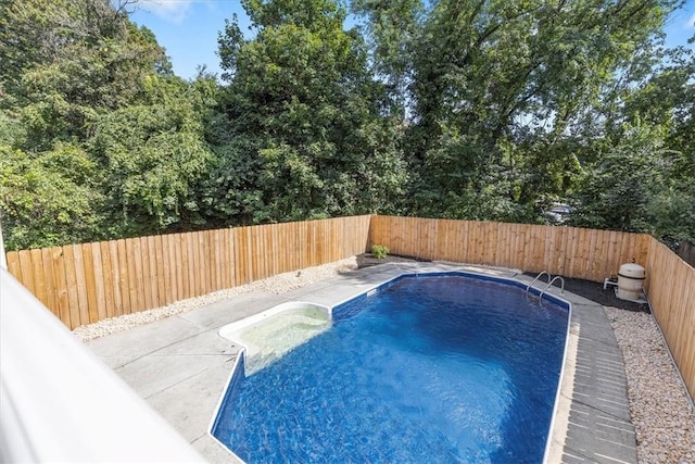 view of pool featuring a patio area, a fenced backyard, and a fenced in pool