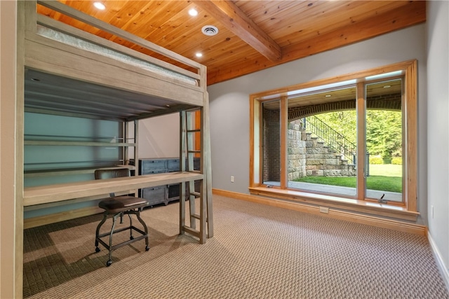 office featuring light carpet, beamed ceiling, and wood ceiling