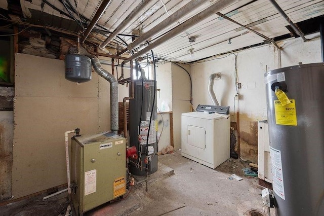 basement with water heater and washer / clothes dryer