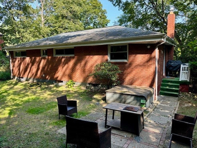 exterior space with a yard and a patio