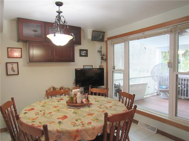 view of tiled dining space