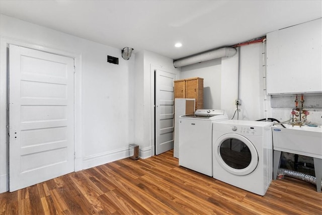 3943 Perrysville Ave, Observatory Hill, PA 15214 - laundry area featuring baseboards, separate washer and dryer, wood finished floors, and laundry area