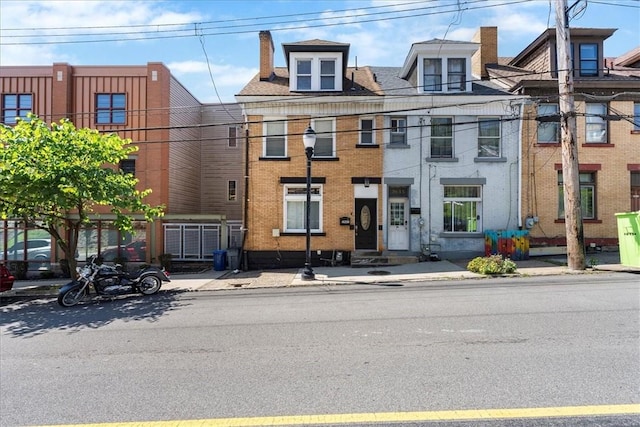 3943 Perrysville Ave, Observatory Hill, PA 15214 - townhome / multi-family property featuring brick siding
