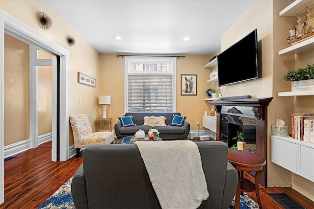 3943 Perrysville Ave, Observatory Hill, PA 15214 - living room featuring wood finished floors, recessed lighting, a fireplace, and baseboards