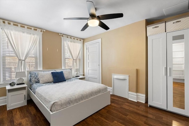 3943 Perrysville Ave, Observatory Hill, PA 15214 - bedroom featuring ceiling fan, two closets, baseboards, and dark wood-style flooring