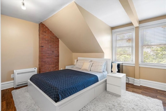 3943 Perrysville Ave, Observatory Hill, PA 15214 - bedroom with lofted ceiling with beams, heating unit, wood finished floors, and baseboards